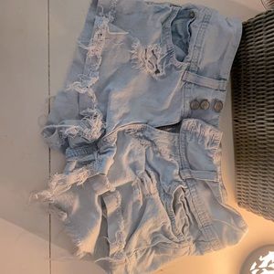 Mid rise, light denim jean shorts.